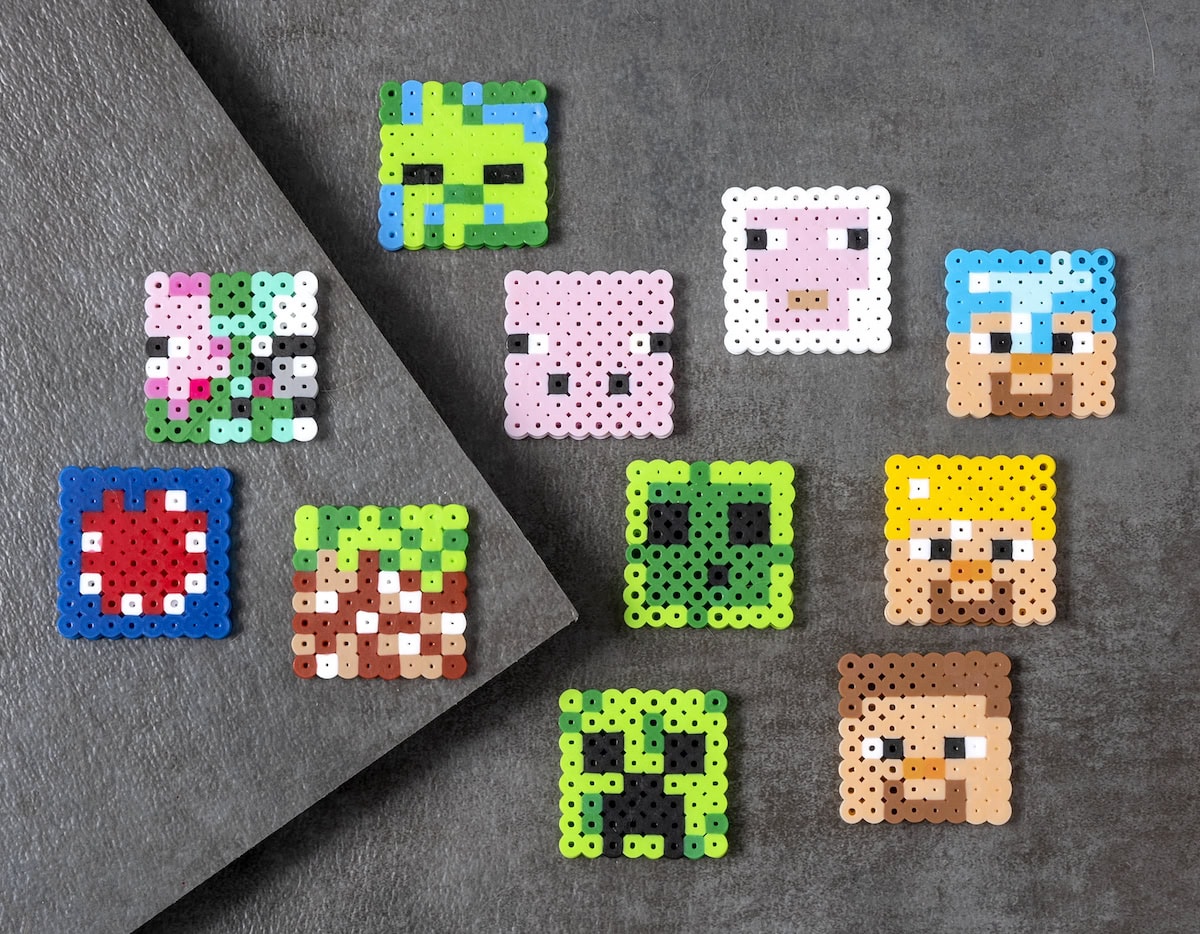 Faces of characters and creatures in Minecraft made with perler beads